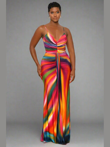 Model wearing a sleeveless multicolor maxi dress with thin straps, a V-neckline, and a flowy, draped skirt — perfect for summer or casual occasions