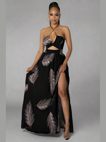 Black halter neck maxi dress with deep V-neckline, sleeveless cut, open back with a self-tie, elastic waistband, and a flowy, draped skirt. model facing forward.