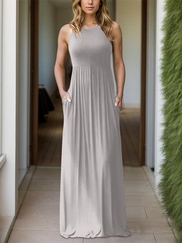 An elegant Grecian neck dress in deep navy, featuring a draped neckline and practical pockets, ideal for both formal occasions and everyday comfort