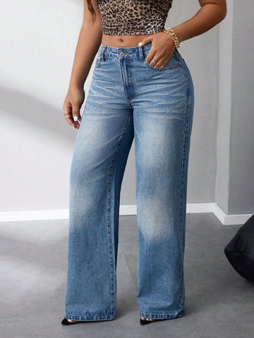 Close-up of the bottom half of the Exude Wide Leg Jeans showcasing the wide-leg fit and frayed hem detail