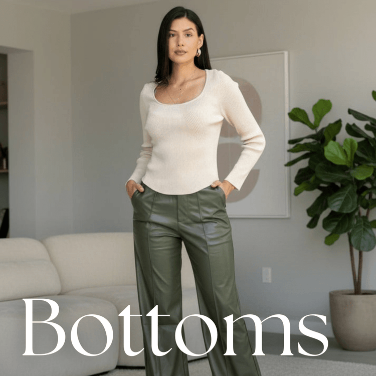 Stylish woman wearing a chic off-the-shoulder top paired with trendy denim jogger pants, highlighting the collection 'Bottoms' with a focus on comfort and style.