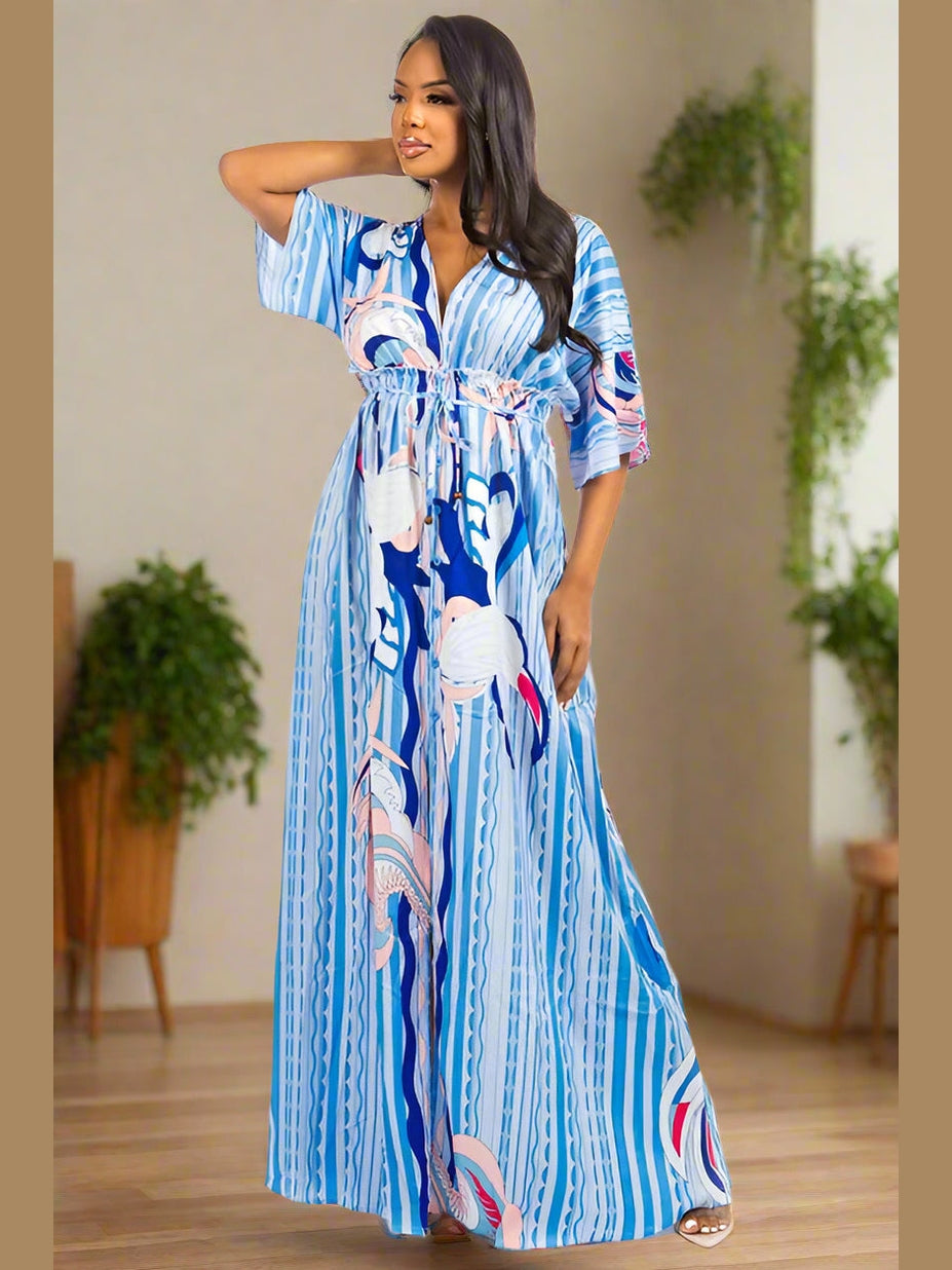 Close-up of the Sunset Breeze Multicolor Dress in Blue, focusing on the multicolor pattern and fabric flow