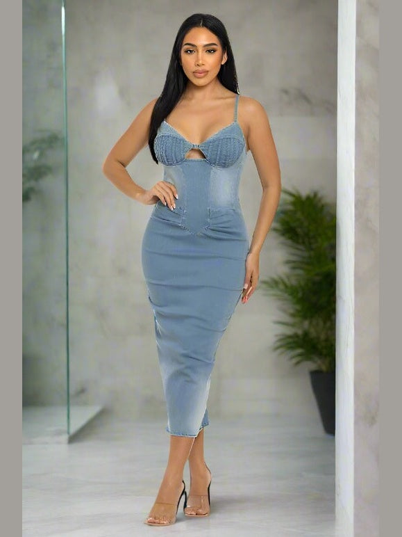 Denim midi dress with a fitted silhouette, sleeveless design, and back zipper closure. Made from 100% cotton for a comfortable, casual look.