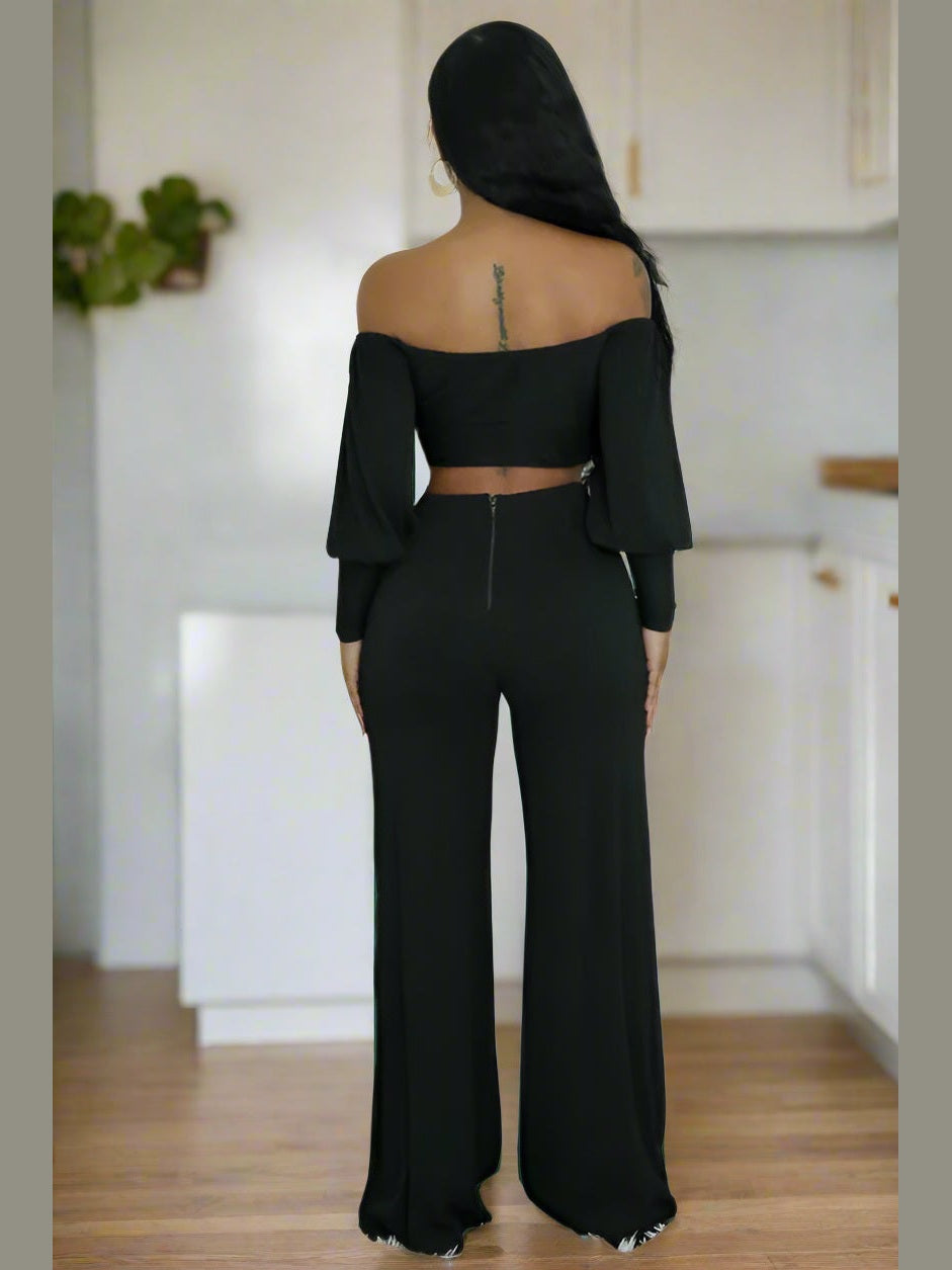 Sweet Harmony Two-Piece Set - Elegant women's fashion set with cropped top and high-waisted pants, perfect for casual or evening wear. Model facing backward. Wearing black Sweet Harmony Two-Piece Set - Elegant women's fashion set with cropped top and high