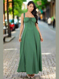Front view of the Friend Zoned Maxi Dress, highlighting the unique  design and flowing skirt.