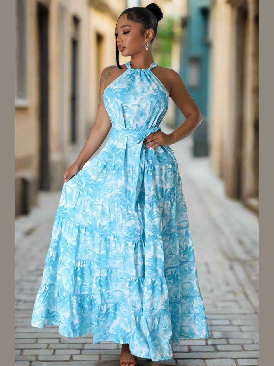 Model in the Summer Fling Maxi Dress in Blue, featuring a self-strip neck back design, exuding elegance and sophistication