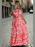Model in the Summer Fling Maxi Dress in Red, featuring a self-strip neck back design, exuding elegance and sophistication